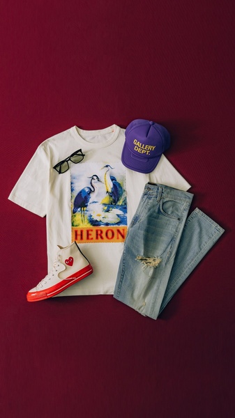 graphic t-shirt, distressed jeans, high top sneakers, trucker hat, fashion glasses, casual outfit, bestseller push, flat lay, energetic, playful, purple, neutral