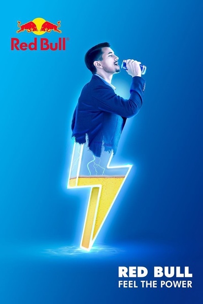 This creative uses a surreal visual metaphor where a professional in a suit transforms into a lightning bolt to represent the immediate energy boost provided by the drink.