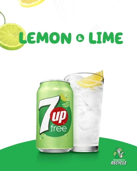 A minimalist, refreshing product hero shot featuring a 7up Free can next to a glass of ice-cold soda garnished with fresh lemon and lime.