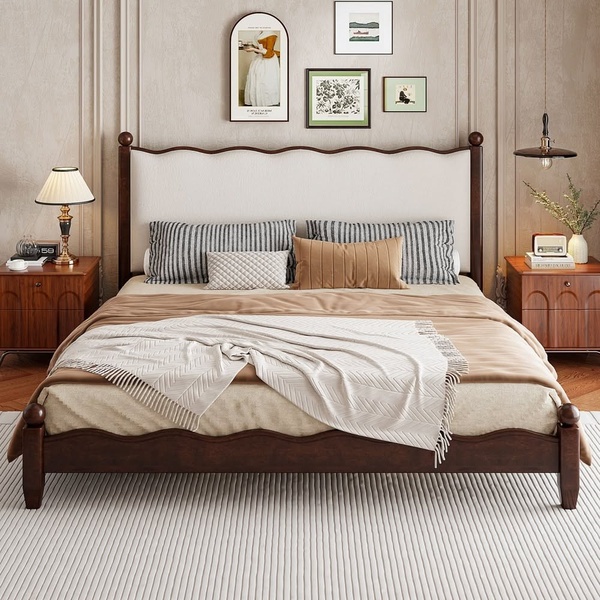 A symmetrically composed, high-end lifestyle shot of a modern wooden bed frame featuring a tufted headboard and natural wood tones.