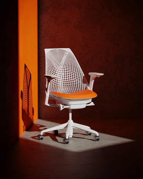 A high-end, clean studio shot of an ergonomic office chair, showcased using dramatic lighting to highlight the structure and premium finish.