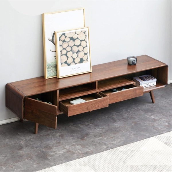 A high-quality, product-focused image of a wooden media console featuring an open drawer to highlight craftsmanship and storage capacity.