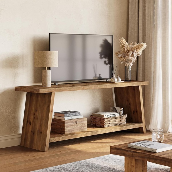 A clean, lifestyle-oriented product hero shot featuring a wooden media console styled with decor and a television in a neutral-toned room.
