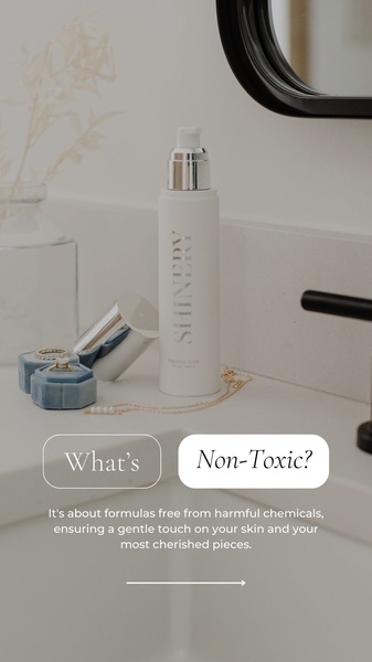 A clean, minimalist 9:16 ad featuring a jewelry cleaning product, focusing on the benefit of non-toxic formulas for delicate items.