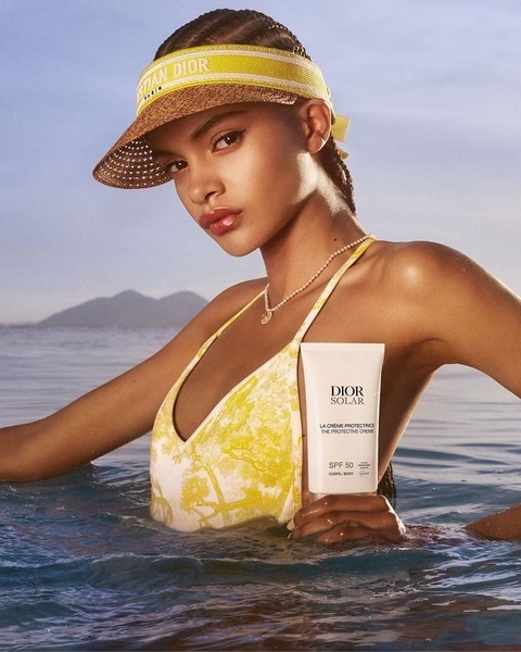 sunscreen, sun protection cream, spf lotion, body sunscreen, sun cream, spf body cream, product launch, brand awareness, editorial, outdoor, luxurious, fresh, yellow, blue, neutral, summer sale