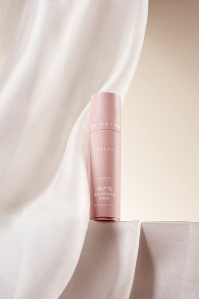 deodorant roll-on, scented deodorant, body fragrance, roll on deodorant, peach scented deodorant, new arrival, brand awareness, minimalist, editorial, calm, luxurious, pink, neutral