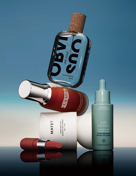 perfume bottle, face serum, exfoliating powder, lip color, scalp serum, beauty products, bestseller push, minimalist, editorial, luxurious, calm, blue, neutral