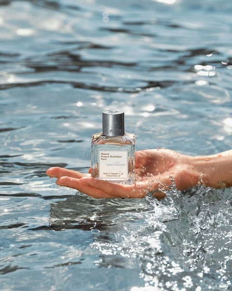 scented body oil, perfumed oil, body fragrance, skincare oil, luxury fragrance, brand awareness, lifestyle, fresh, luxurious, blue, neutral