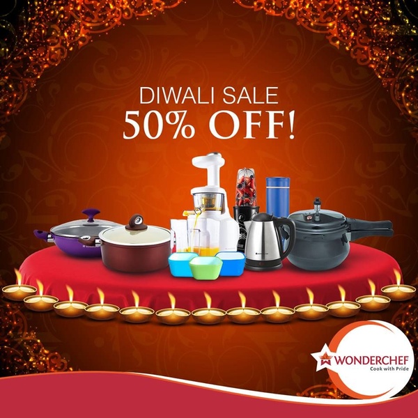 A festive product showcase featuring a diverse collection of cookware and appliances on a red pedestal, highlighted by traditional oil lamps and a 50% discount offer.