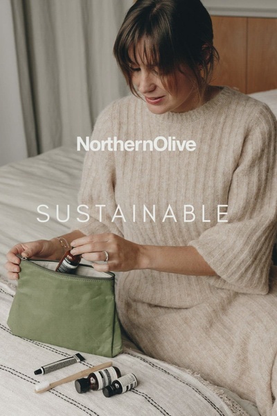 toiletry bag, makeup bag, travel pouch, cosmetic bag, wash bag, travel organizer bag, brand awareness, product launch, lifestyle, editorial, calm, warm, neutral, green