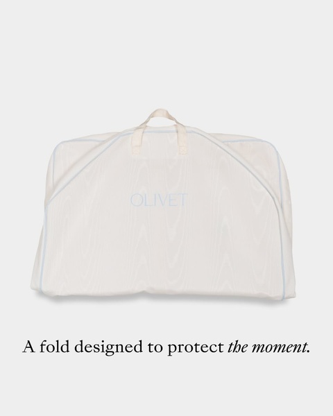 garment bag, suit bag, dress storage bag, clothing travel bag, wedding dress bag, garment carrier, brand awareness, product launch, minimalist, editorial, calm, luxurious, neutral, blue