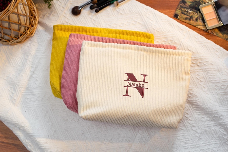 cosmetic bag, toiletry pouch, makeup bag, travel pouch, zippered pouch, new arrival, lifestyle, flat lay, calm, fresh, neutral, pink, yellow
