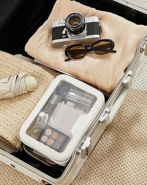 travel toiletry bag, makeup organizer, clear makeup bag, toiletry pouch, cosmetic travel case, new arrival, flat lay, lifestyle, calm, fresh, neutral