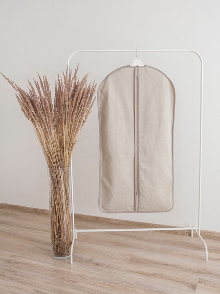 garment bag, clothing cover, dress bag, suit bag, travel garment cover, minimalist, lifestyle, calm, neutral