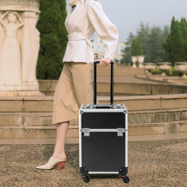rolling makeup case, makeup trolley, cosmetic suitcase, travel makeup case, beauty trolley, cosmetic train case, product demo, lifestyle, calm, trustworthy, neutral, black