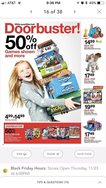 This ad creative features a young girl holding a stack of various toys to highlight a 50 percent off sale for the holiday season.