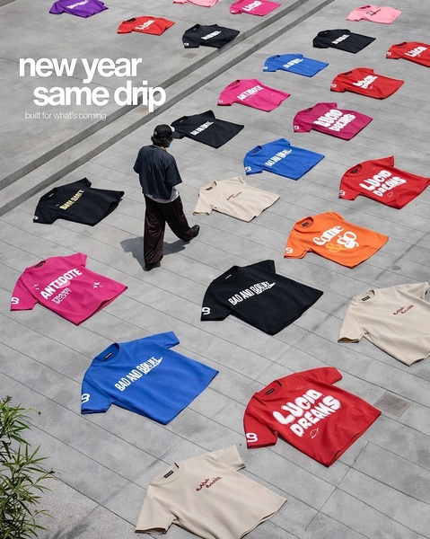 graphic tee, printed t-shirt, graphic t-shirt, statement tee, logo shirt, crew neck tee, new arrival, brand awareness, outdoor, flat lay, bold, energetic, red, blue, pink, new year