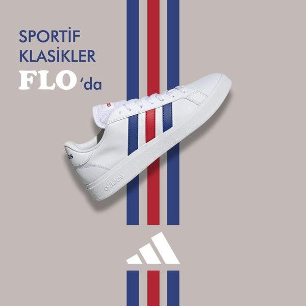 A high-contrast running shoe ad featuring a clean product presentation against a neutral backdrop with color-coordinated graphic accents.