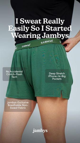 A direct-to-camera style image showing lounge shorts with text overlays highlighting specific user benefits like fabric breathability and pocket utility.