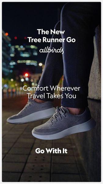 A vertical 9:16 ad featuring close-up, low-light photography of running shoes worn in a city environment to highlight travel comfort.