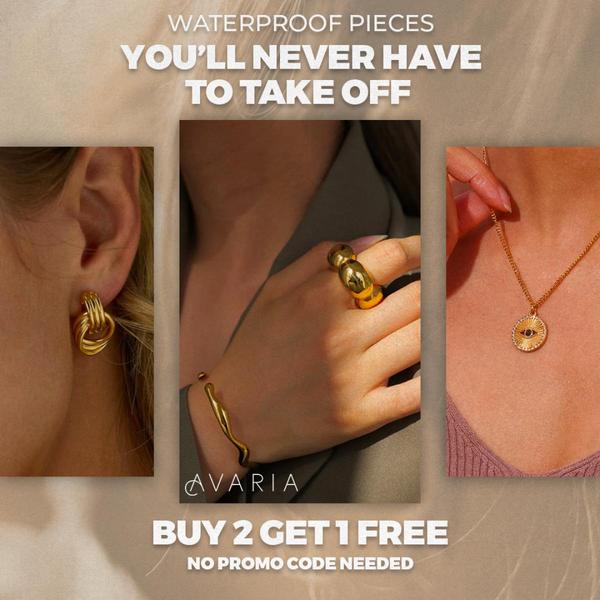 A 1:1 social ad showcase featuring a triptych layout of gold jewelry with a prominent 'Buy 2 Get 1 Free' promotional incentive.