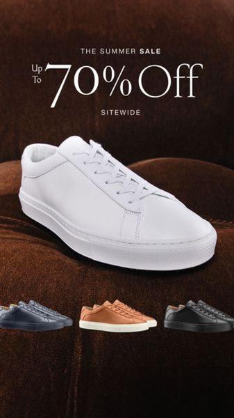 A high-conversion 9:16 vertical creative featuring a clean white sneaker centered on a dark textured background with clear sitewide sale messaging.