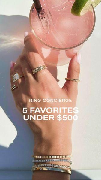 A lifestyle-focused social creative showcasing multiple gold ring and bracelet stack pieces next to a refreshing drink.