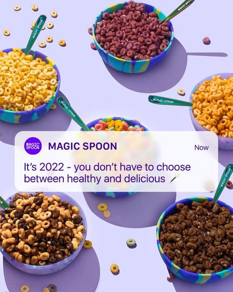 A top-down, clean product shot of multiple cereal bowls arranged in a grid pattern with a mobile-style notification bubble placed in the center.