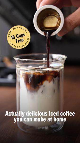 A close-up shot capturing a slow-motion pour of coffee into a glass of milk and ice, featuring a clear, benefit-driven overlay text and a promotional badge.