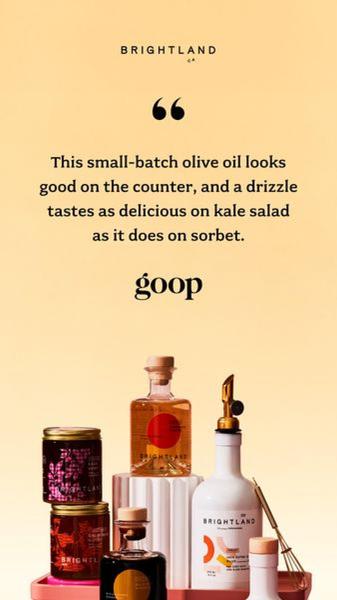 A high-end product display of premium olive oil bottles paired with a sophisticated editorial quote from a lifestyle publication.