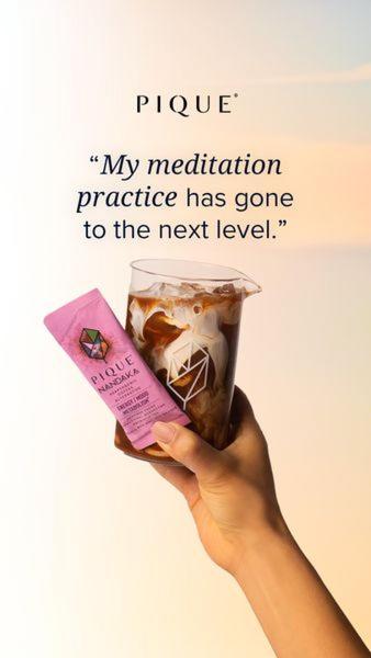 A close-up, hand-held shot of a coffee alternative beverage paired with a text overlay highlighting the personal benefit of enhanced meditation practice.
