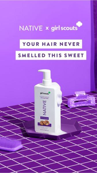 A high-contrast, purple-themed advertisement for shampoo, utilizing a clean, studio-product setup to emphasize a sensory brand collaboration.