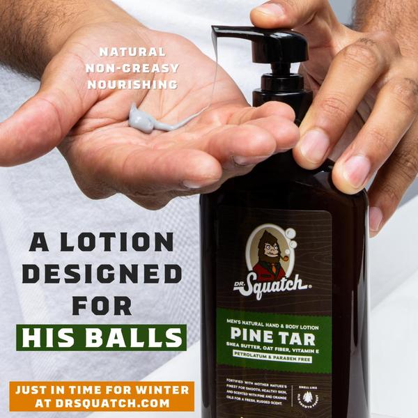A close-up shot of a hand holding a bottle of body lotion with a pump, clearly displaying the brand label and the product texture.