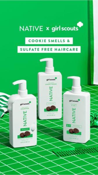 A clean, studio-lit product photography shot showcasing a shampoo, conditioner, and 2-in-1 set in a bold, consistent green brand theme.
