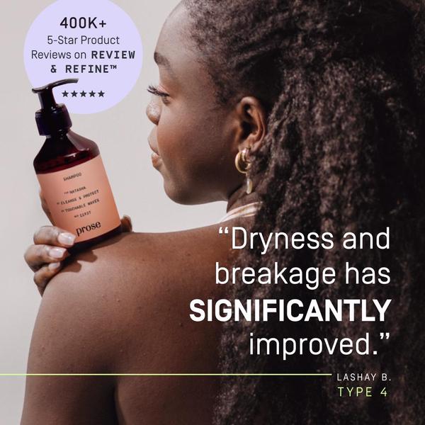 A 1:1 format advertisement featuring a customer testimonial highlighting hair dryness improvement alongside product brand recognition.