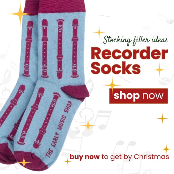 This ad features a product-focused holiday campaign using a simple, high-contrast layout to highlight the recorder socks as a stocking filler.
