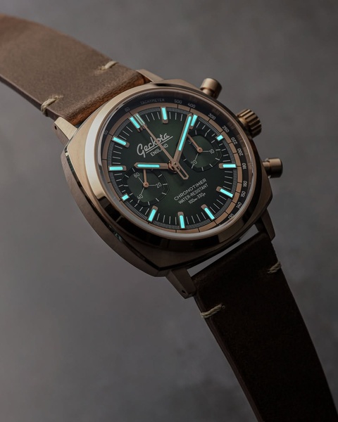 chronograph watch, leather strap watch, analog watch, mens wrist watch, luxury chronograph, brand awareness, minimalist, editorial, luxurious, calm, brown, neutral