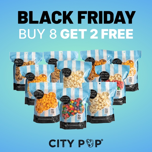 A square-ratio ad creative featuring a central pyramid of popcorn bags with a clear, bold Black Friday discount offer at the top.
