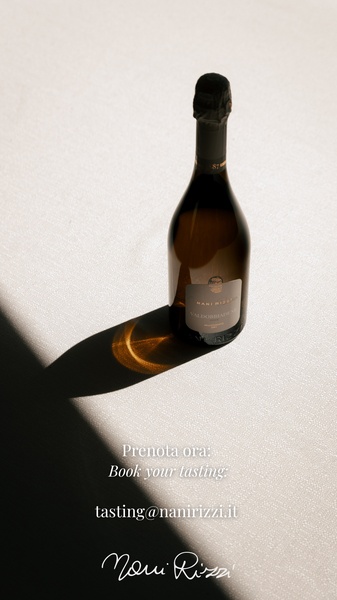 A high-contrast, minimalist shot of a single wine bottle featuring a direct call-to-action for a tasting appointment.