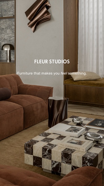 A high-end lifestyle interior photograph showcasing a premium sofa in a warm, tonal living room setting.