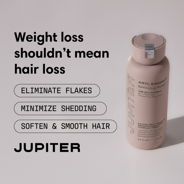 A clean, minimalist product spotlight for an anti-dandruff shampoo that directly addresses the intersection of health changes and hair health.