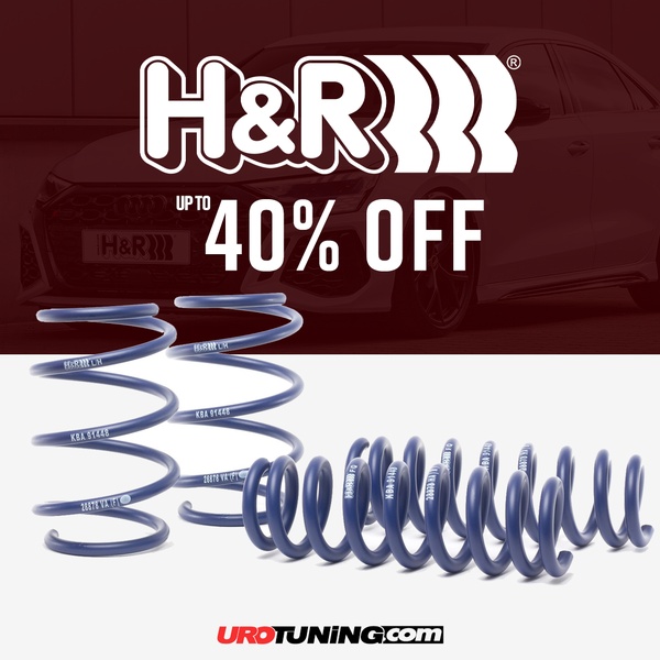 A clean, high-contrast promotional graphic featuring performance lowering springs set against a blurred vehicle silhouette with a clear 40% discount offer.