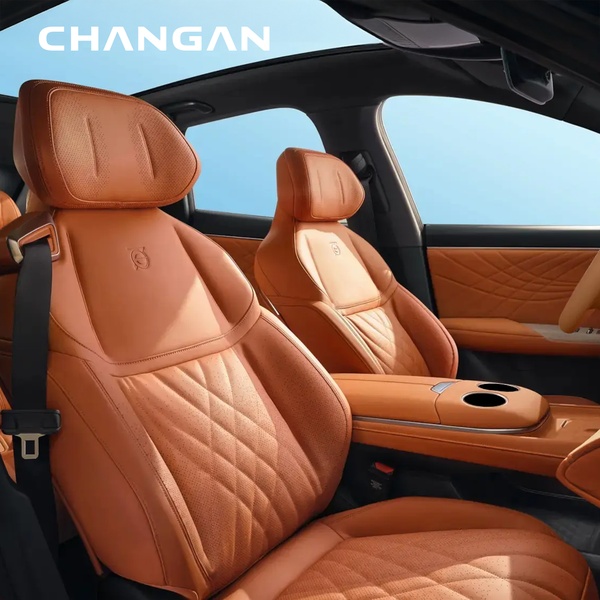 A close-up, high-quality shot of the premium leather interior of a car, focusing on seat design and stitching.