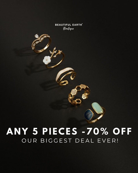 A minimalist, high-contrast creative showcasing a curated set of five rings with a bold 70% off discount offer.