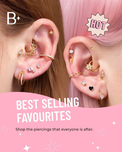 A close-up aesthetic shot featuring two ears with multiple curated gold and diamond piercings, utilizing a soft pink background and a star-themed design overlay to highlight top-performing items.