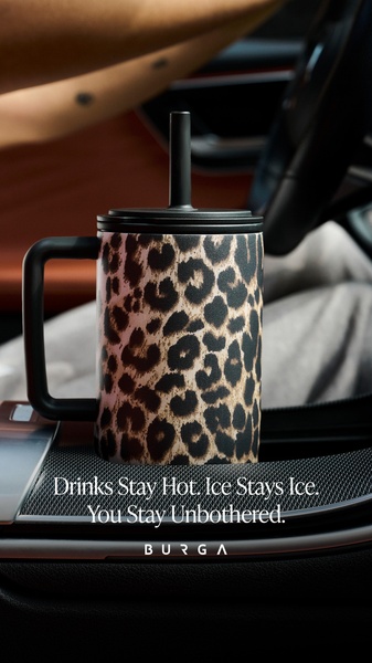 A high-quality 9:16 vertical image showcasing a patterned stainless steel tumbler in a car cup holder, emphasizing daily convenience and temperature retention.