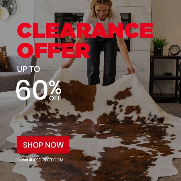 A clear, bold promotion highlighting a seasonal discount on a premium cowhide rug using high-contrast typography over a real-world product usage shot.