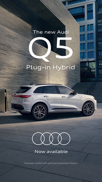 A minimalist studio-style outdoor shot of a white SUV with professional lighting, highlighting the vehicle design and brand presence.