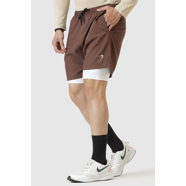 A high-clarity, studio-shot image showcasing the functional details and layering of men's 2-in-1 athletic shorts.