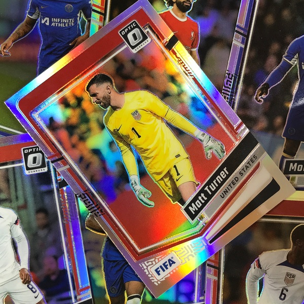 A close-up, high-quality promotional shot of a sports trading card, emphasizing its holographic texture and premium athlete branding.